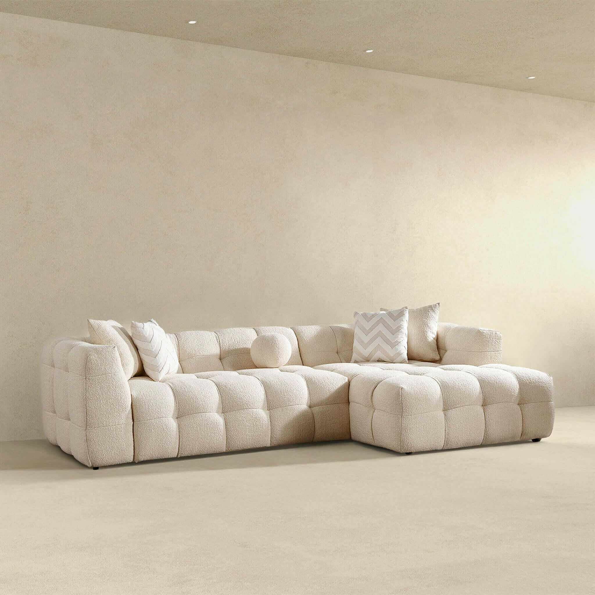 Alana Tufted Ivory Boucle Right Sectional Sofa.