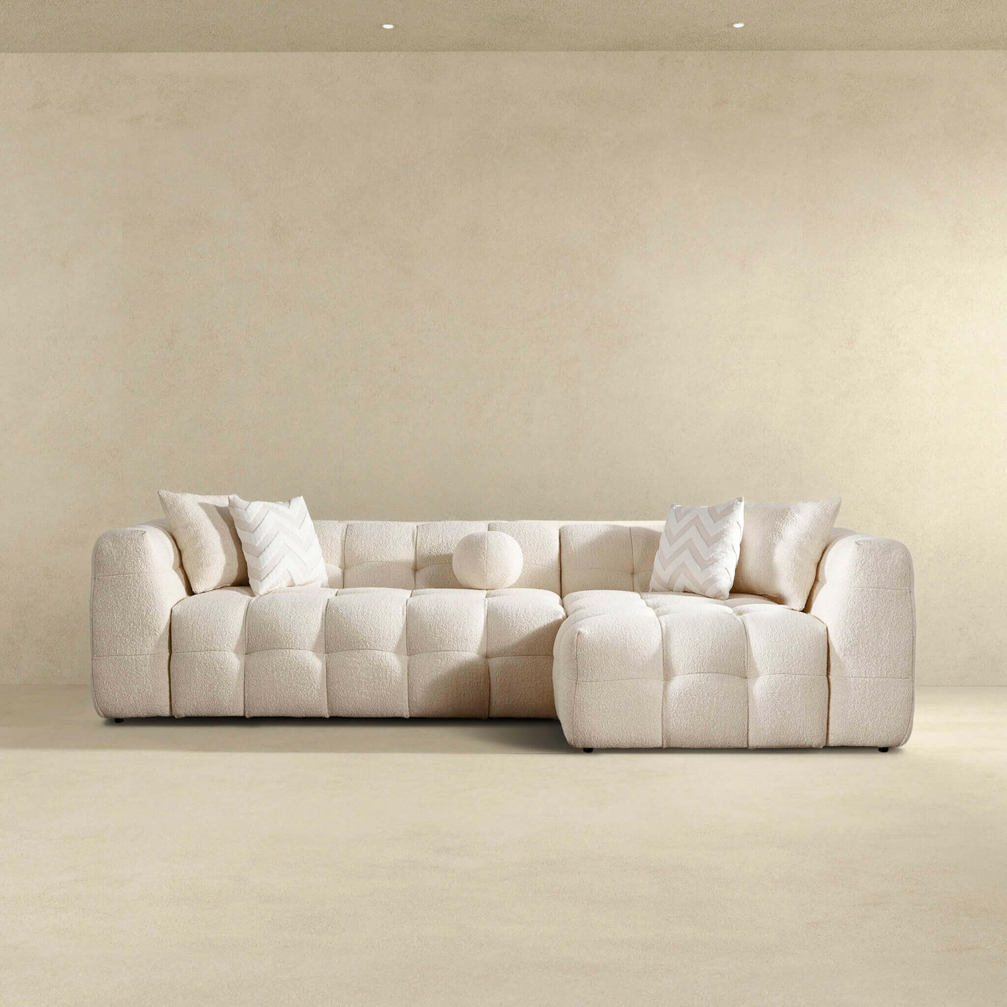 Alana Tufted Ivory Boucle Right Sectional Sofa.