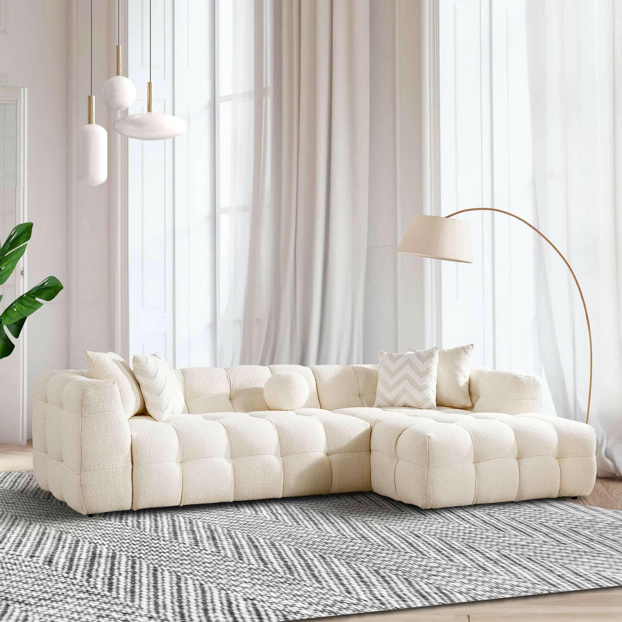 Alana Tufted Ivory Boucle Right Sectional Sofa.