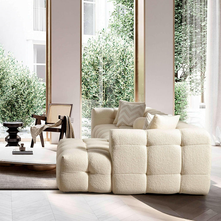 Alana Tufted Ivory Boucle Right Sectional Sofa.