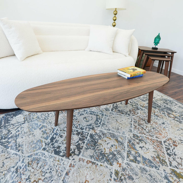 Carsen Walnut Oval Center Table.