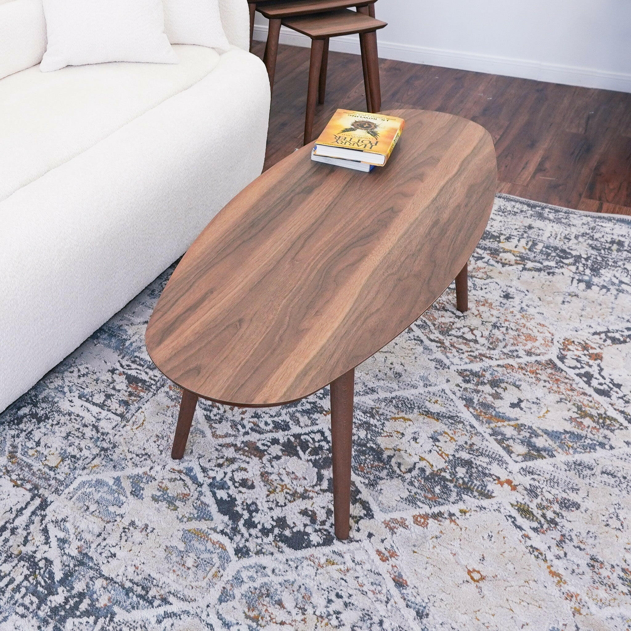 Carsen Walnut Oval Center Table.