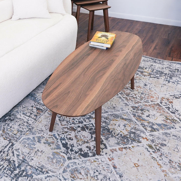 Carsen Walnut Oval Center Table.