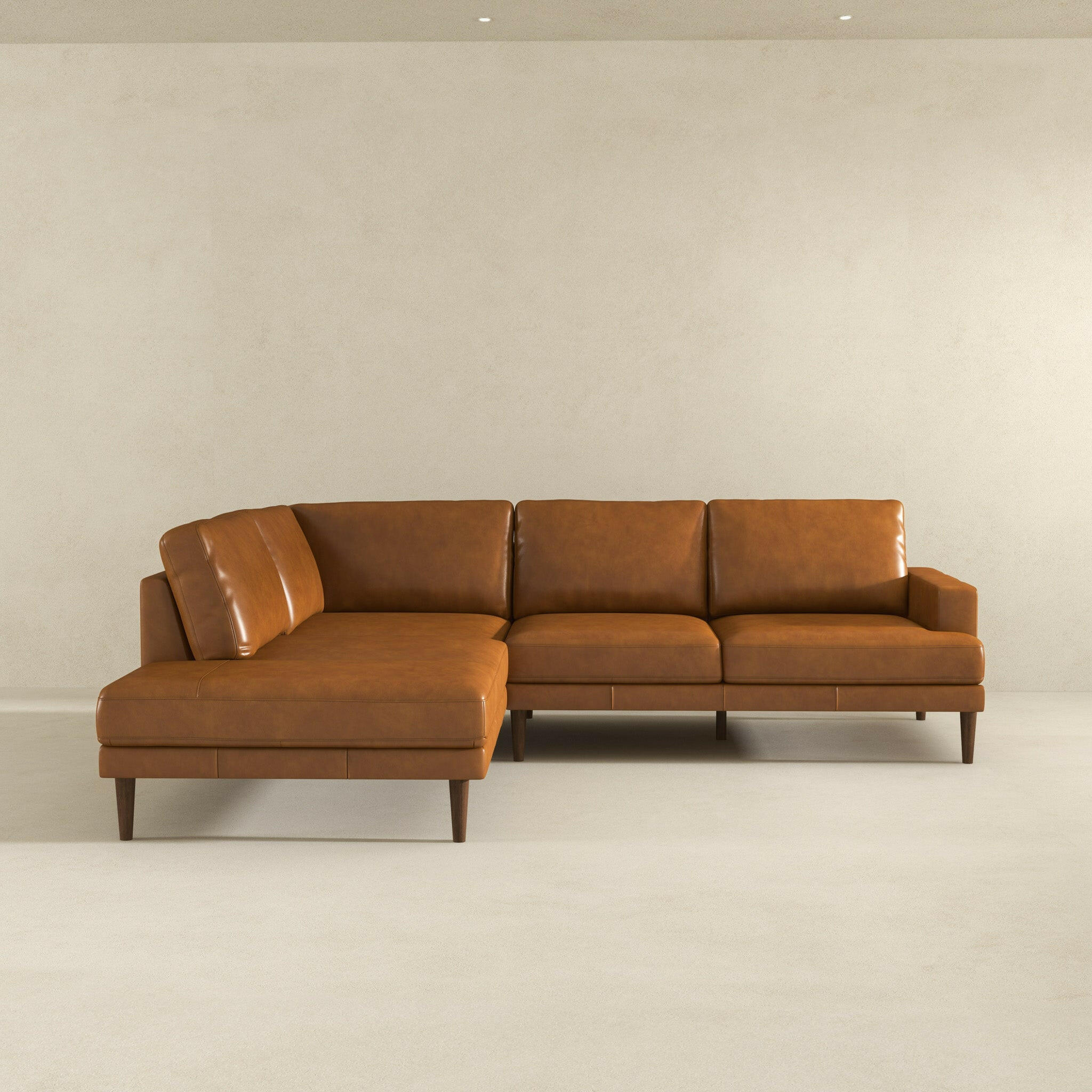 Corbin Left-Facing Tan Leather Sectional Sofa.