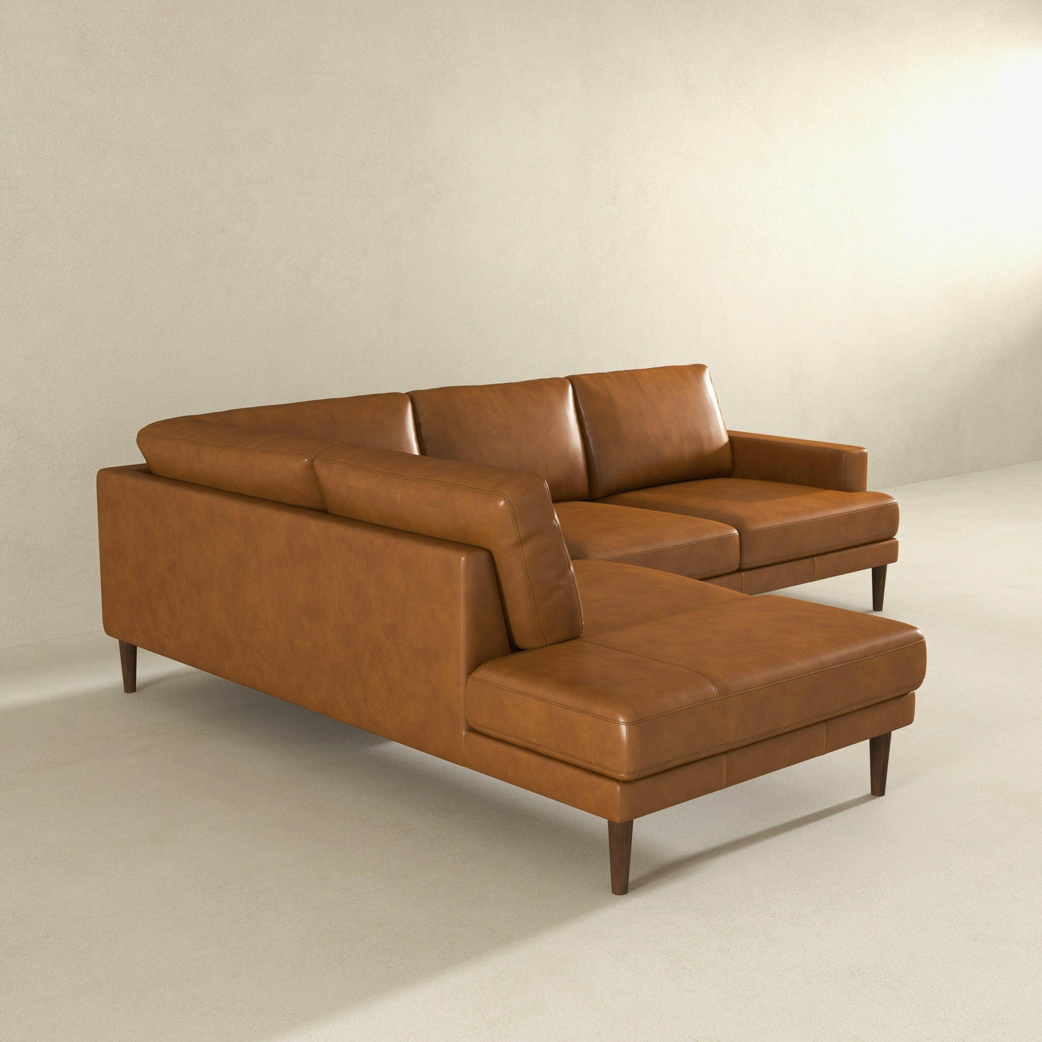 Corbin Left-Facing Tan Leather Sectional Sofa.