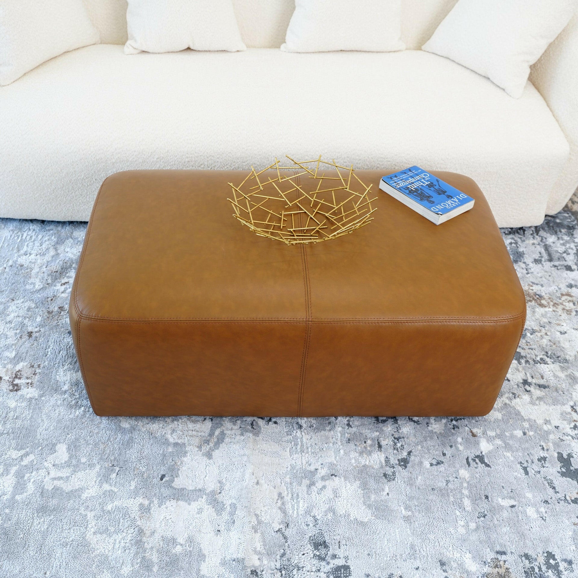 Ingram Tan Leather Ottoman.