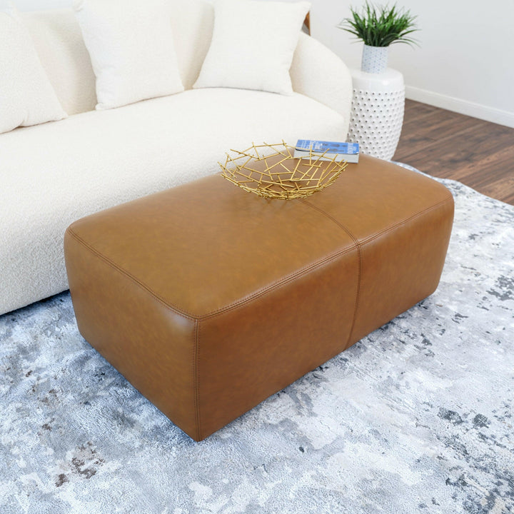 Ingram Tan Leather Ottoman.