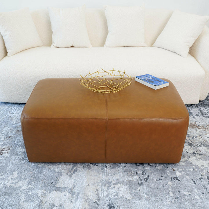 Ingram Tan Leather Ottoman.