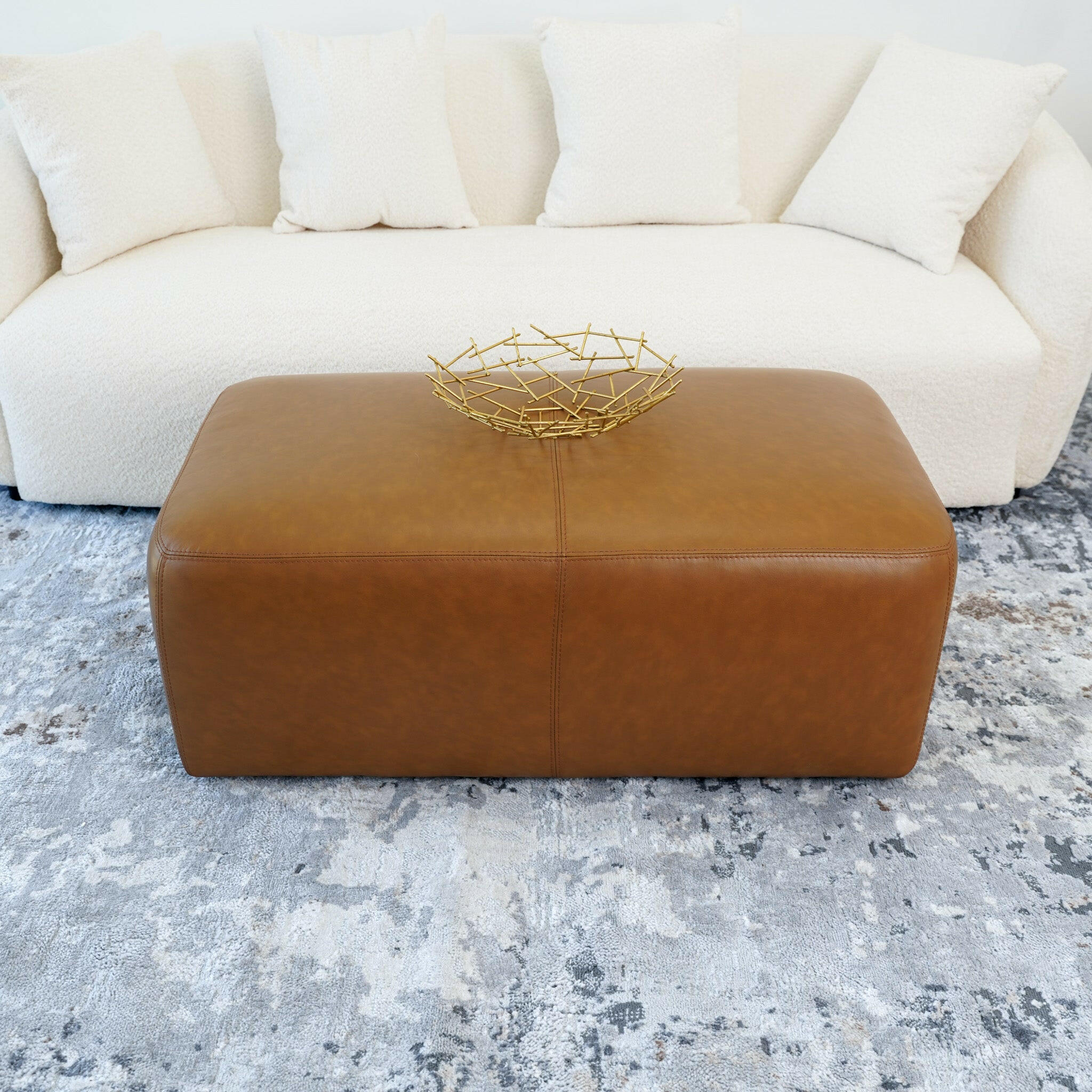 Ingram Tan Leather Ottoman.