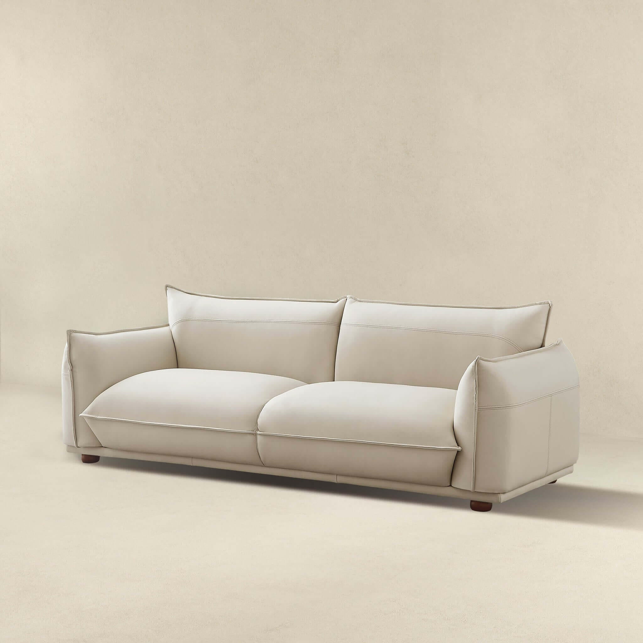 Emma Mid Century Modern Luxury Cream Leather Sofa.