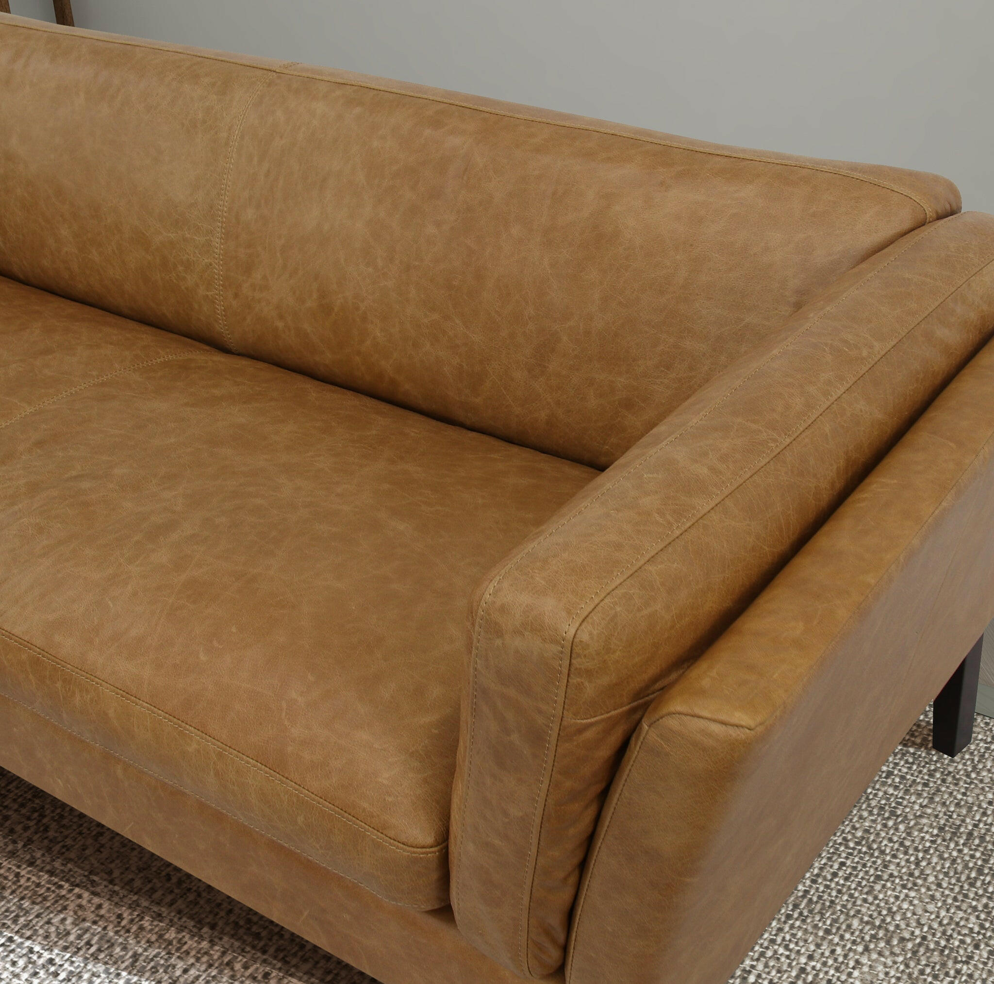 York Waxy Tan Leather Sofa.